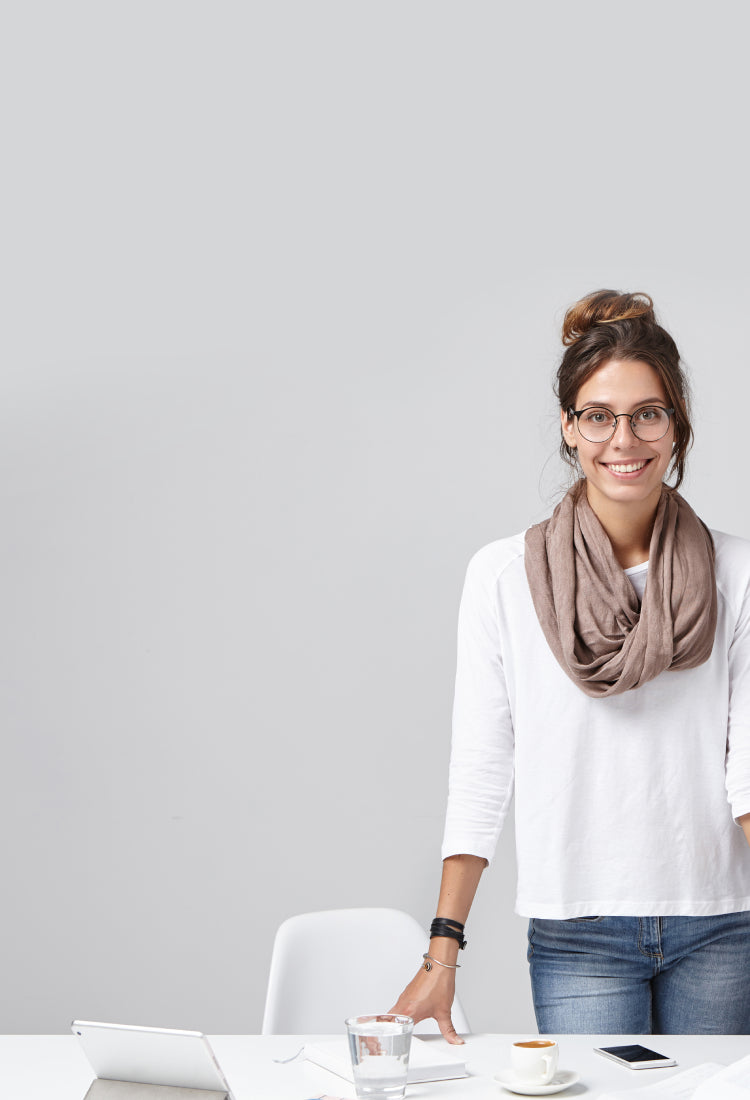 Female business owner affiliate partner standing at a desk