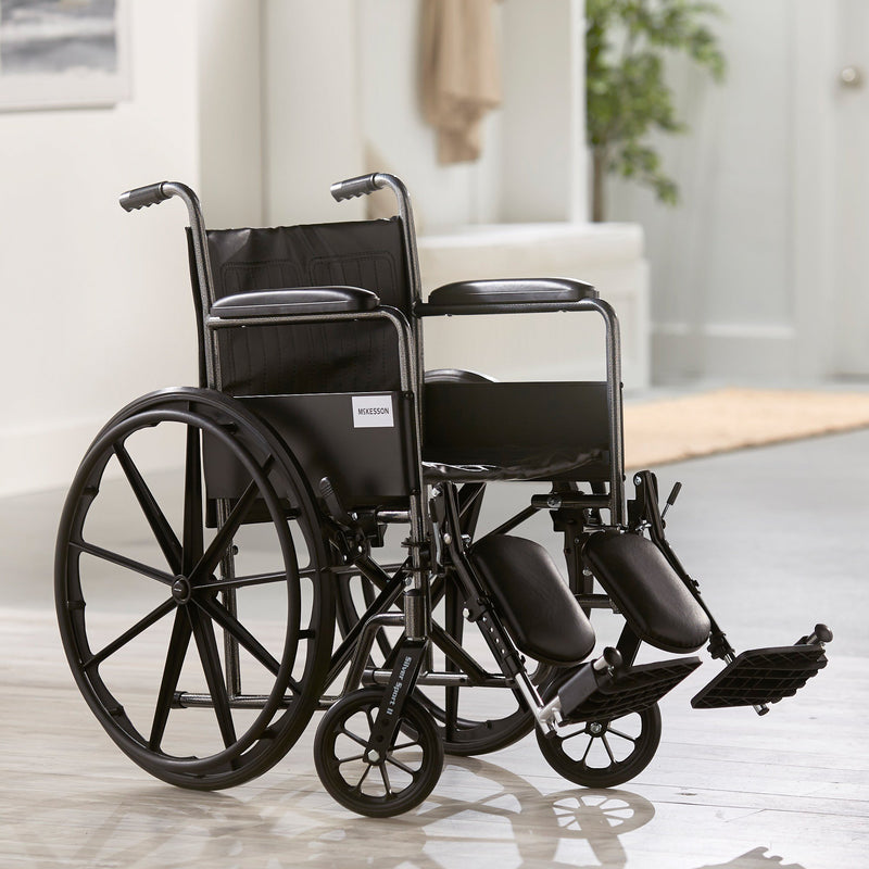 McKesson Dual Axle Wheelchair Full Length Arm Swing-Away Elevating Footrest, 18 Inch Seat Width -Each McKesson Dual Axle Wheelchair Full Length Arm Swing-Away Elevating Footrest, 18 Inch Seat Width -Each