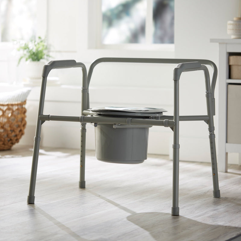 McKesson Fixed Arm Steel Folding Commode Chair, 15½ – 22 Inch -Each McKesson Fixed Arm Steel Folding Commode Chair, 15½ – 22 Inch -Each