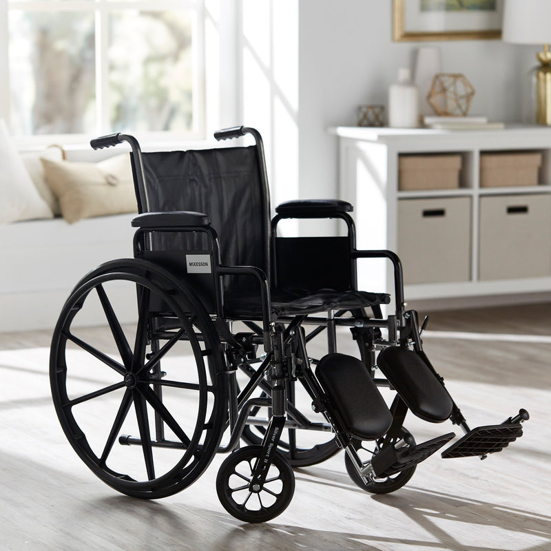 McKesson Dual Axle Wheelchair with Desk Length Arm Swing-Away Elevating Legrest, 18 Inch Seat Width -Each McKesson Dual Axle Wheelchair with Desk Length Arm Swing-Away Elevating Legrest, 18 Inch Seat Width -Each