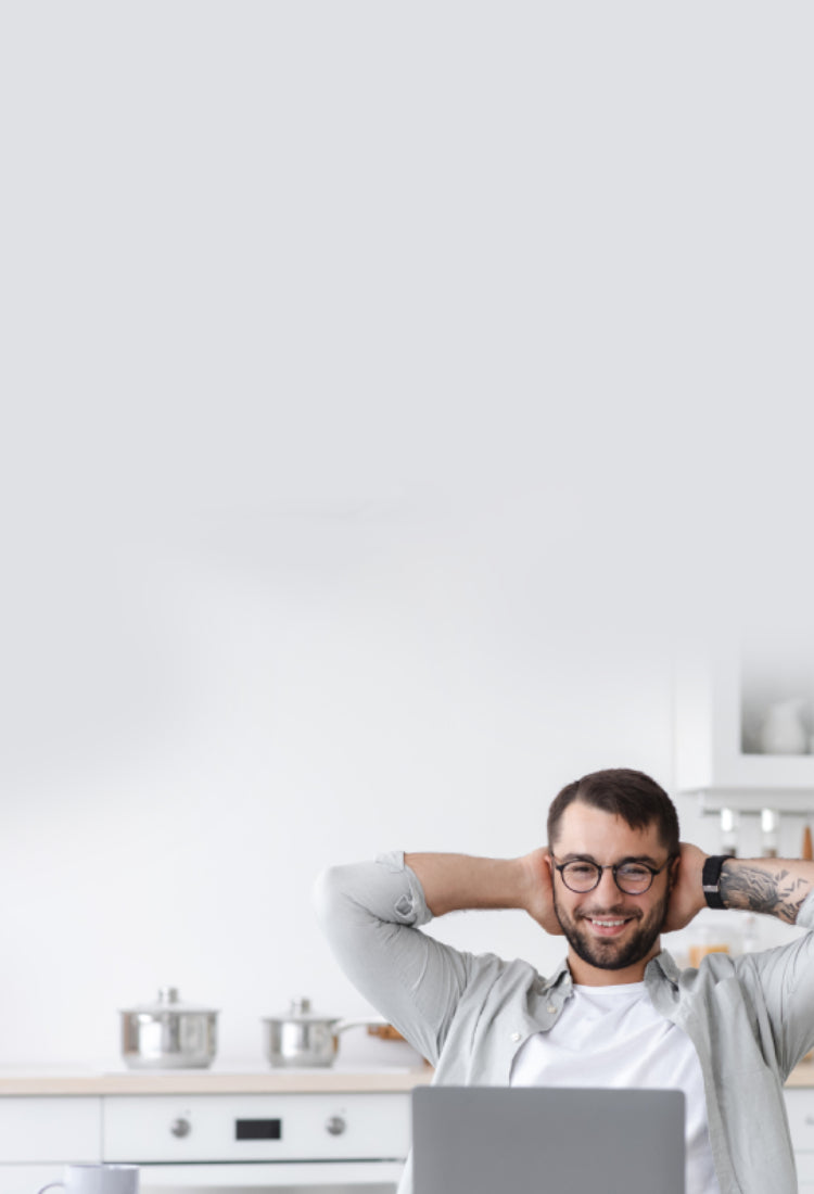 Man facing his laptop