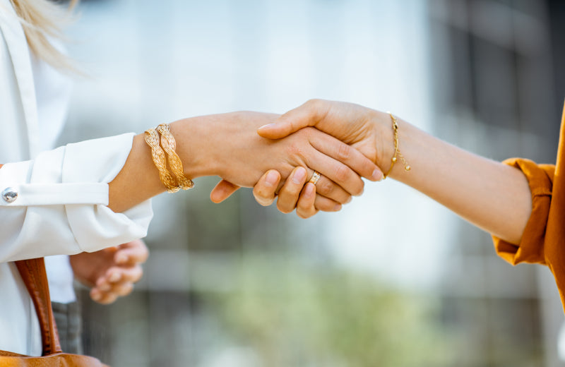 long term partnership handshaking women