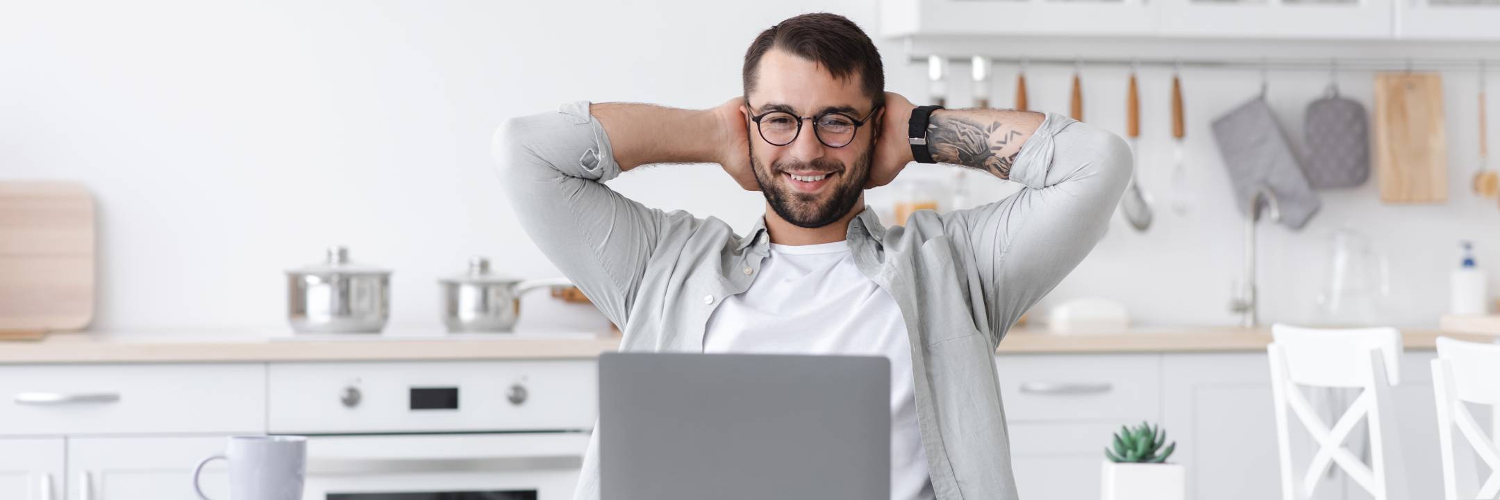 Man facing his laptop 