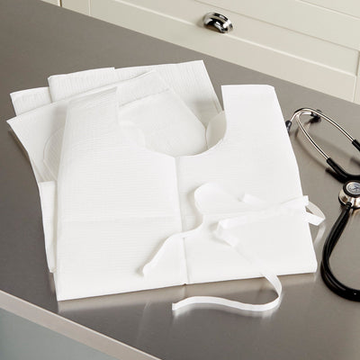 McKesson Deluxe Patient Exam Gown, One Size Fits Most, White -Case of 50